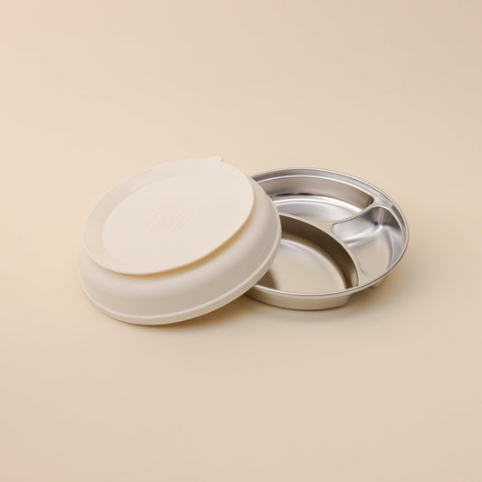 Oat silicone suction base separated from the stainless steel plate.